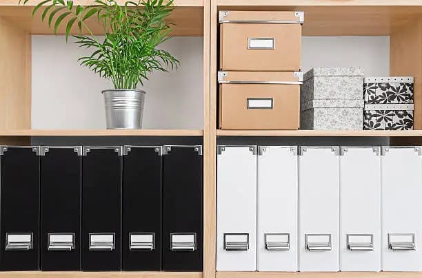 image of organizational folders on shelving unit